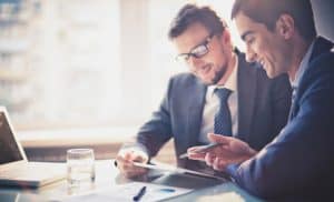two-men-discussing-business