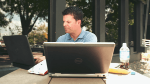 man studying outside