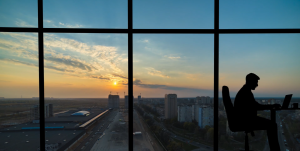 Man Working in front of Window